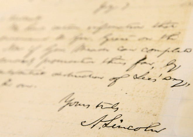 President Abraham Lincoln's signature is seen on a handwritten note, dated July 7, 1863, addressed to Maj. Gen. Henry Halleck, during the Civil War, as it is displayed for the first time at the National Archives in Washington.