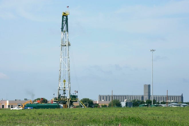 With Fort Worth sitting on one of the nation's largest natural gas fields, 150-foot drilling rigs are rising over golf courses, churchyards, even tree-lined neighborhoods.