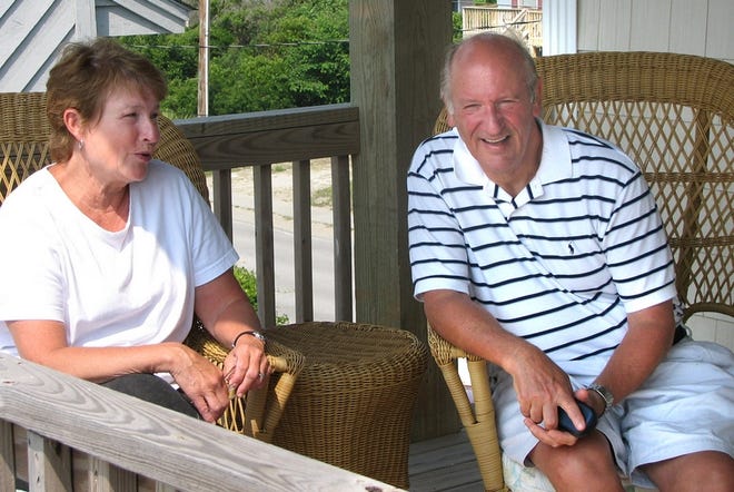 Ann and Don Kornblet sit on the porch of their Surf City house. They split their time between another house in Topsail Island and St. Louis.