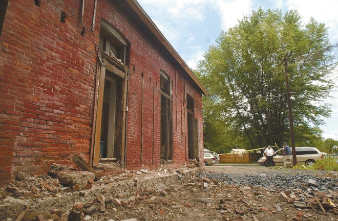 The parsonage of the Little Bethel Church in Stroudsburg has been removed as part of a restoration project of the original structure.