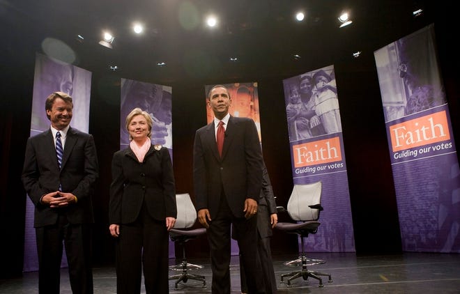 From left, Democrat presidential candidates John Edwards, Sen. Hillary Rodham Clinton (D.-NY) and Sen. Barack Obama (D.-Ill.) pose at a forum on faith and politics in Washington, D.C. on June 4.