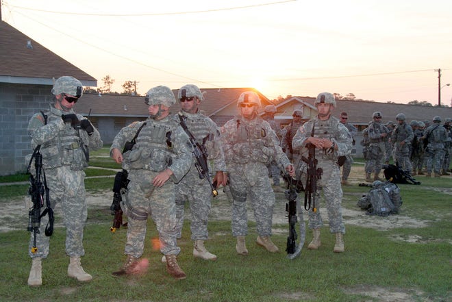The day begins at sunrise in Camp Shelby, Miss., where the 181st Infantry's Hudson-based Delta Company has been preparing for service in Iraq.
