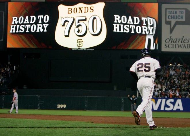 San Francisco Giants' Barry Bonds (25) runs the bases after hitting his 750th career home run off Arizona Diamondbacks' Livan Hernandez in the eighth inning of a baseball game Friday in San Francisco. The blast puts Bonds within six of breaking Hank Aaron's home run record.