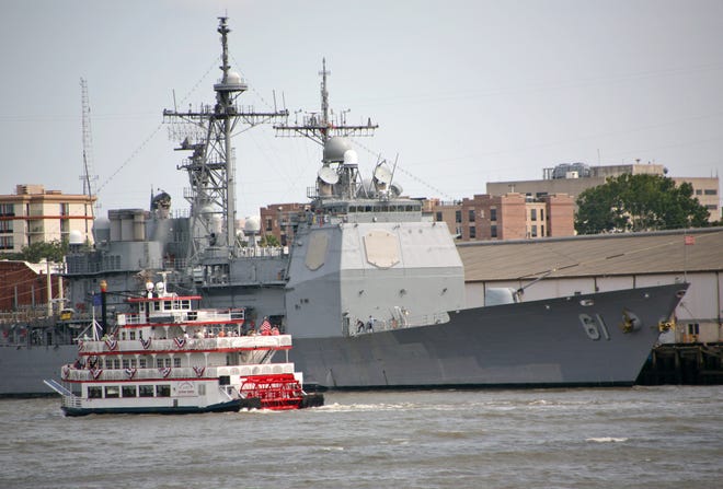 The USS Monterey is greeted by the River Queen during its visit to Savannah for the July Fourth holiday. Although the U.S. Navy ship is not open for tours, the public is welcome to watch the ship's crew take part in a soccer game at Daffin Park at 6 p.m. today.