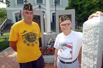 From left, "Mayor of Mudville" Bobby Blair, American Legion Commander, and George Snow, VFW Commander.