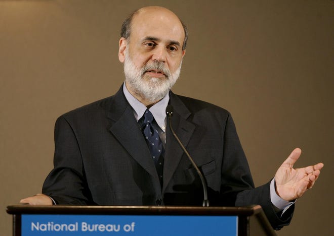 Federal Reserve Chairman Ben Bernanke addresses the Monetary Economics Workshop of the National Bureau of Economic Research Summer Institute in Cambridge on Tuesday.