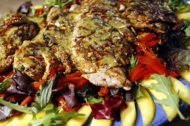 Jamaican Jerk Chicken Salad with a Honey Mustard Vinaigrette. Jerk is a 250-year-old style of Jamaican barbecue using a fiery paste made of indigenous Jamaican allspice berries, Scotch peppers and other ingredients.