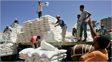 Palestinians unloaded flour on Wednesday at a United Nations food aid center in Gaza, where the flow of supplies slowed after Hamas took over.