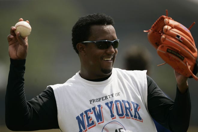 New York Mets' Pedro Martinez throws during a work out Monday, March 26, 2007 in Port St. Lucie, Fla. (AP Photo/Julie Jacobson)