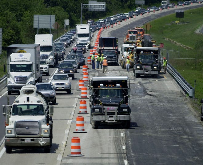 Southbound traffic moves slowly around a construction site on Interstate 495 on Friday as seen from the Washington Street bridge in Franklin.