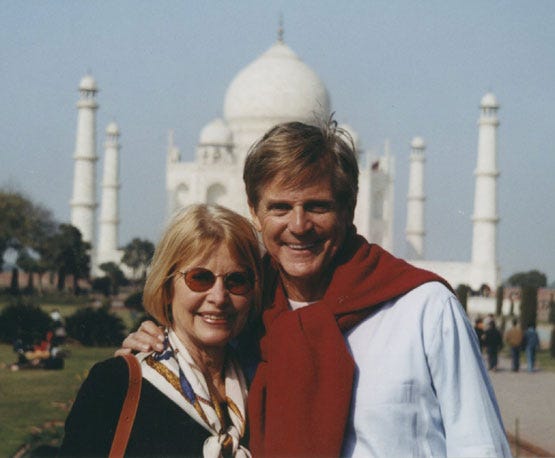 Rick and Aase Thompson in front of the Taj Mahal.