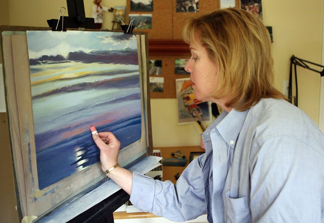 Sudbury artist Jeanne Smith works on a seascape in pastel.