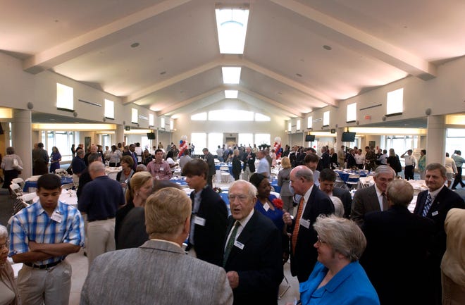 Guests of the the Savannah/Hilton Head International Airport's grand opening reception of the terminal expansion Wednesday mingle in the expanded area. Five gates have been added to the terminal. Hunter McRae/Savannah Morning News