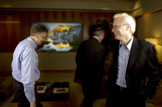 Ray Ozzie, right, and Craig Mundie, center, will take over two of Bill Gates’s roles at Microsoft.