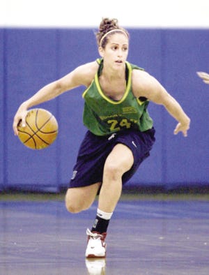 Hudson Valley's Julianne Viani, #24 of Poughkeepsie and Marist College, dribbles in the back court during their Empire State Games Open Women's Gold Medal game against Adirondack Region at Westchester County College in Valhalla, NY on Sunday, July 29, 2007. Times Herald-Record/Chet Gordon