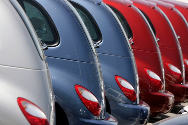 A long row of unsold 2007 PT Cruisers sits outside a Chrysler-Jeep agency in the east Denver suburb of Aurora, Colo., on Sunday, July 22, 2007. Major automakers are scheduled to report July sales trends on Wednesday, Aug. 1, 2007. Auto sales figures, which include sales of sports utility vehicles, trucks and cars, are considered an important indicator of consumer demand. Sales of these big-ticket items typically comprise 25 percent of the nation's total retail sales. (AP Photo/David Zalubowski)