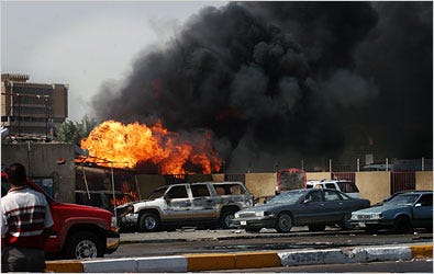 A suicide attacker ignited a fuel tanker on Wednesday in Baghdad, killing at least 50 people at a gas station.