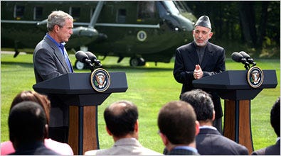 President Bush and President Hamid Karzai of Afghanistan speaking at a news conference on Monday at Camp David, Md.