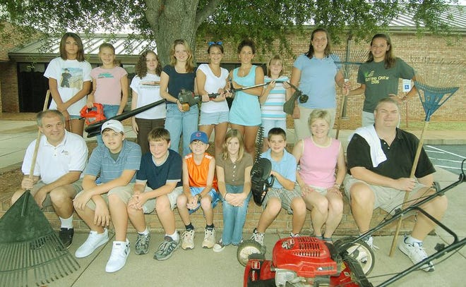 Teens from Trinity Presbyterian Church known as The Cutting Crew perform yard work during the summer.