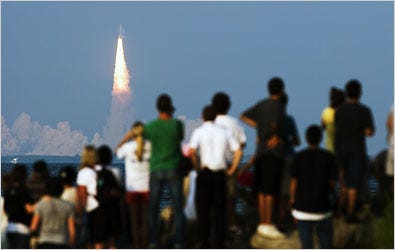 Spectators watched as the space shuttle Endeavour lifted off from Kennedy Space Center in Florida.