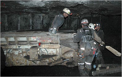Workers clearing a passageway Tuesday in the effort to reach six miners trapped in the Crandall Canyon Mine in Utah.