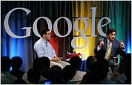 Bill Richardson, right, with Elliot Schrage of Google.