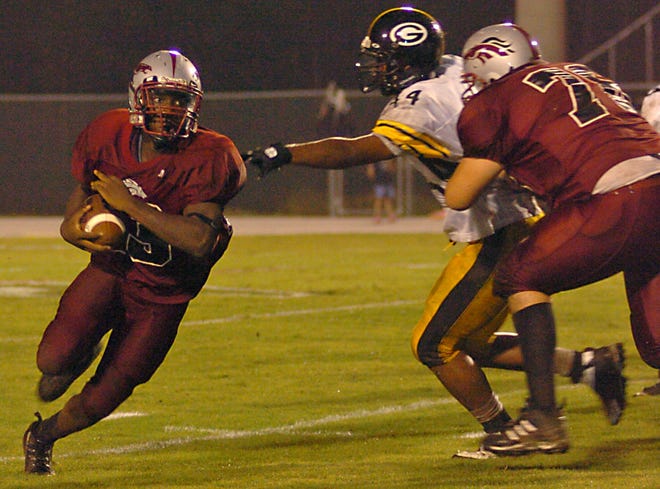 South Effingham's Frank Manker gains yardage during Friday night's game against Groves High.