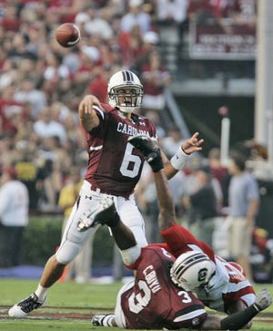 South Carolina quarterback Tommy Beecher (6) throws upfield during the first half of a football game against Louisiana-Lafayette, Saturday, Sept. 1, 2007, in Columbia, S.C. South Carolina won 28-14.