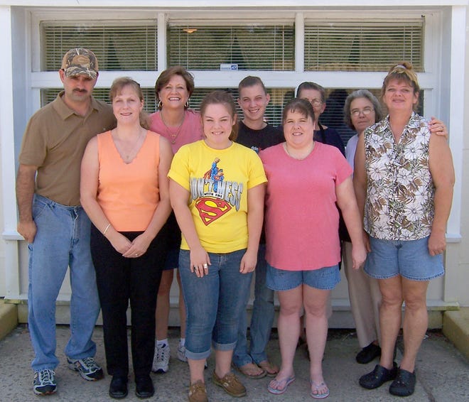 Jimmy Cowart and his staff of Cowart's Southern Backyard Cafe in Blitchton. Front row, from left: Jimmy Cowart, LaDonna Cowart, Marissa Rice, Malissa Smith, Terrie Kennedy. Back row, from left: Pam Bridges, Kim Leggett, Delores Ward, Nina Turner.