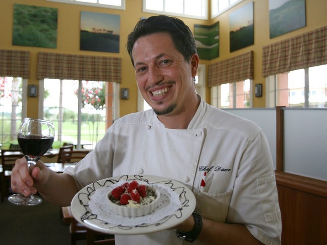 Chef Dave Bland poses with his Chocalte Creme Brulee at the Candler Hills Golf Club Restaurant in Southwest Ocala.