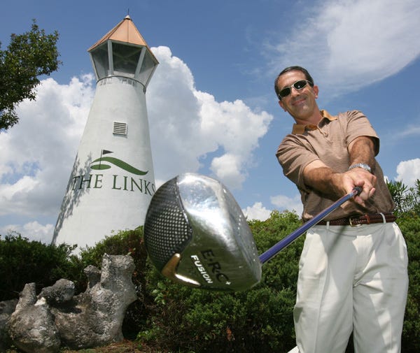Ken Kirkpatrick poses at The Links Golf Course at Spruce Creek South on Friday. Kirkpatrick is the manager of Spruce Creek Golf LLC. and owns Heritage Management.