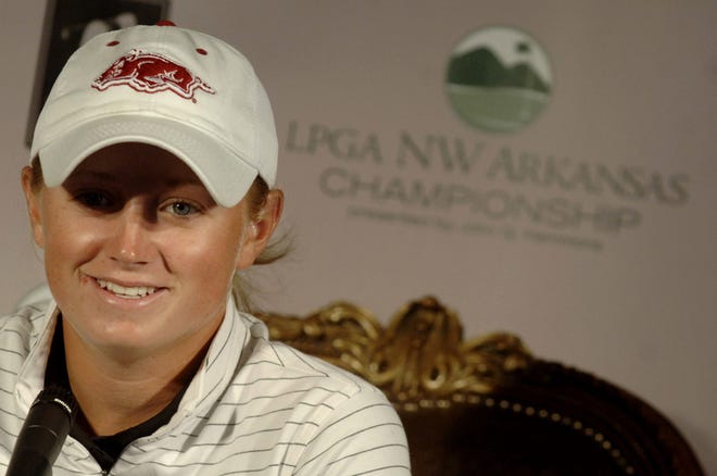 Stacy Lewis answers questions during a news conference following the finish of the rain delayed first round of the LPGA Tour's NW Arkansas Championship golf tournament at Pinnacle Country Club, Sunday, Sept. 9, 2007, in Rogers, Ark. Lewis, a senior at the University of Arkansas, held the first round lead of the tournament which was shortened from 54 holes to 18. Lewis isn't considered an official winner because the tournament did not last at least 36 holes.