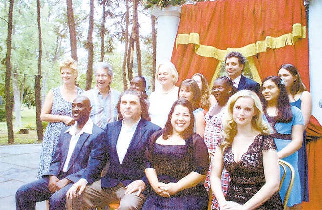 Members of the Opera Company of the Highlands, including Claudia Cummings, standing, center, after a summer performance of "Opera Goes to Broadway" at Downing Park in Newburgh.