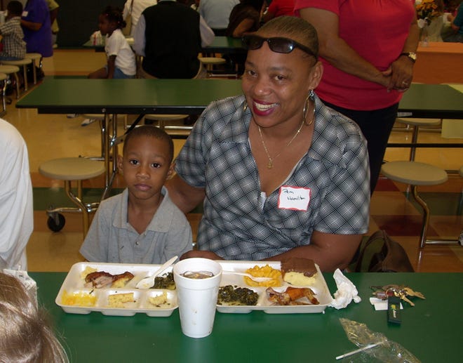 Pam Hamilton, of Augusta, has lunch with her grandson Rayonta Whitfield Jr., 4, during Grandparents Day at Monte Sano Elementary School. Visiting parents and grandparents also went to the pupils' classrooms.
