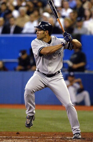 Johnny Damon bats against the Blue Jays last night in Toronto. Damon tied the game 1-1 with a solo homer in the sixth inning.