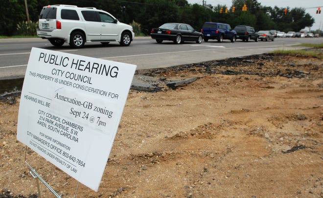 A sign announcing a public hearing for annexation of almost 1 acres is posted at Dougherty and Whiskey roads in Aiken.