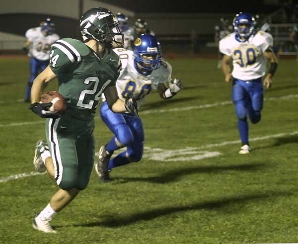 Minisink Valley's James Ferrier heads for the end zone to score a touchdown against Washingtonville during a game in Slate Hill on Sept. 14, 2007.