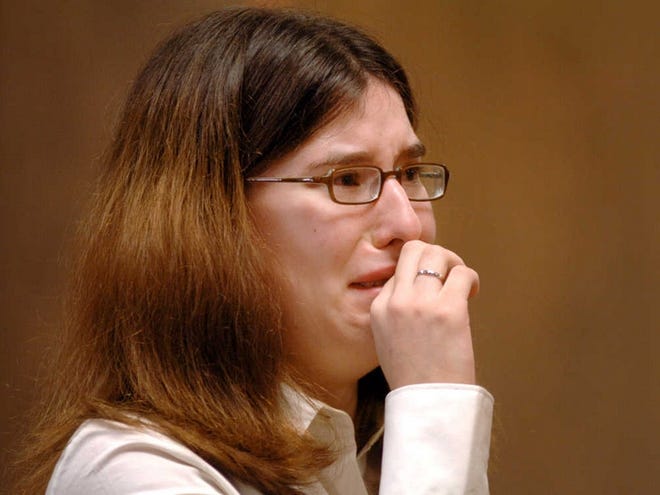 Rebecca Richard breaks down yesterday during her sentencing in Fitchburg District Court.