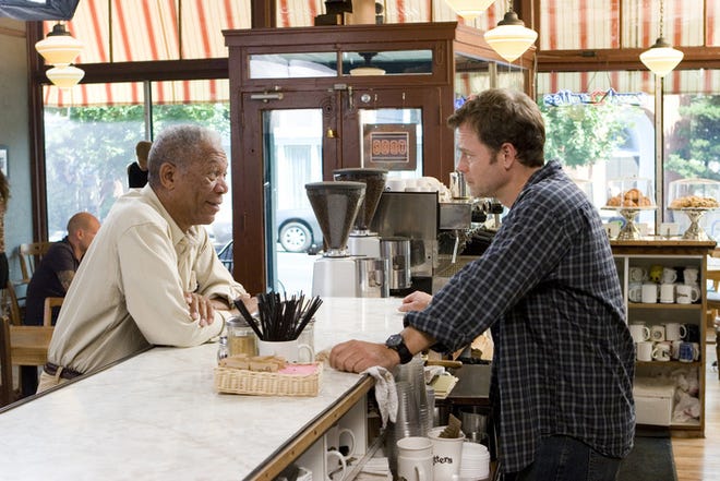 Morgan Freeman (left) as local philosophy professor Harry Stevenson talks with Greg Kinnear (as Bradley) in Feast of Love.