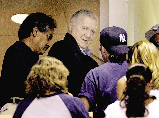 New York Yankees owner George Steinbrenner meets fans during the fifth inning of a baseball game against the Tampa Bay Devil Rays Wednesday night Sept. 26, 2007 in St. Petersburg, Fla. (AP Photo/Chris O'Meara)