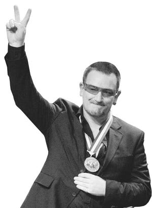 Bono celebrates Liberty Award.