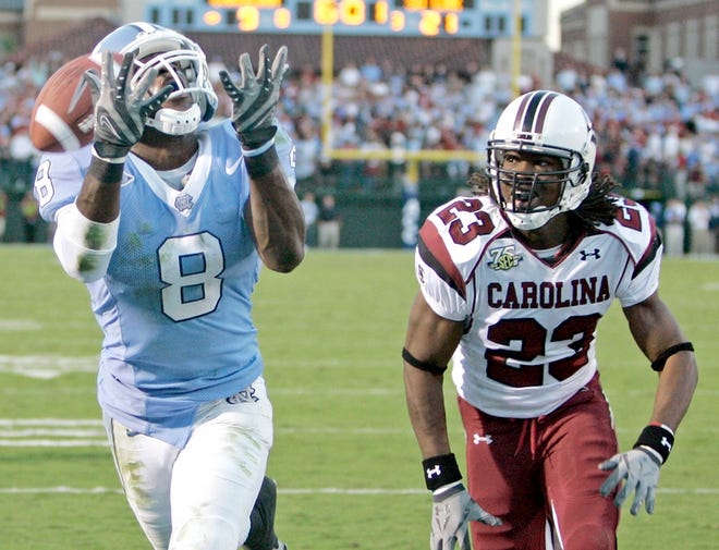 North Carolina's Greg Little (8) watches a touchdown pass slip through his arms in the second half Saturday.