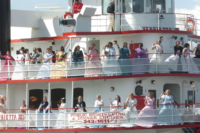 Azalea Belles line the decks of the 'Henrietta III' in 2004.