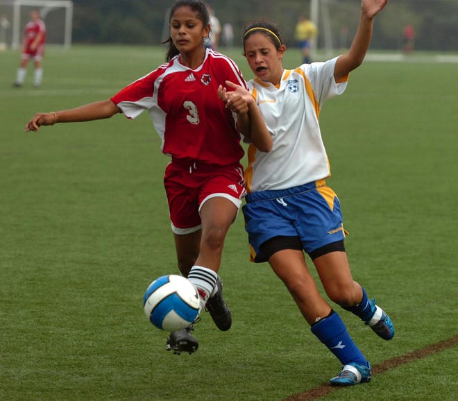 Anna Kouri (right) and the LHS girls soccer team wraps up the regular season on Saturday in Burlington.