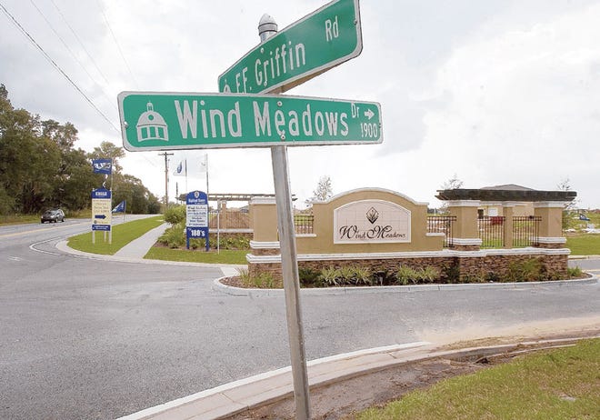 Street markers at the intersection of E.F. Griffin Road and Wind Meadows Drive are signs of the area's growth.