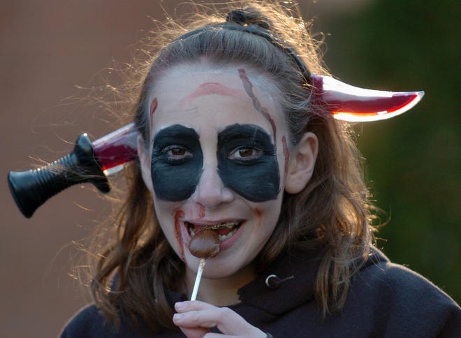 Lauren Karlson, 10, from Franklin, has fun at the Franklin Police Department's Halloween party.