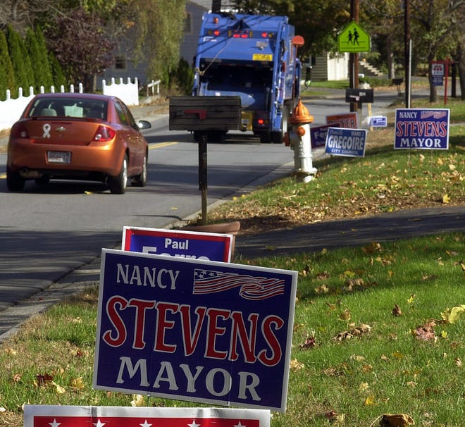 Marlborough mayoral incumbent Nancy Stevens has several signs along Farm Road on Monday.