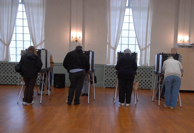 Plainfield residents cast their ballots at the Plainfield Town Hall on Tuesday.