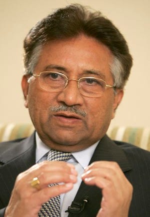 In a file photo Pakistan's President Gen. Pervez Musharraf speaks during an interview with the Associated Press in Rawalpindi, Pakistan, Nov. 14, 2007.  Pakistan's reconstituted Supreme Court on today dismissed legal challenges to Musharraf's continued rule, a senior official said.