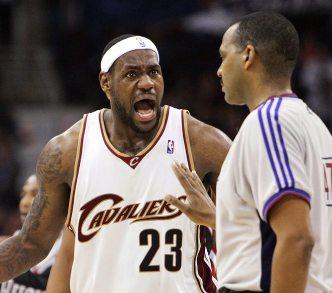 Cleveland's LeBron James disagrees with a foul call by referee Bernie Adams on Tuesday.